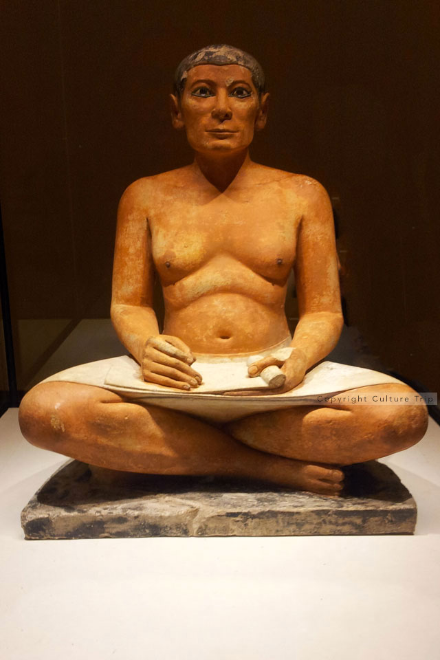 Scribe assis
